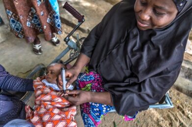 Faltmata Mustapha, a polio survivor, had accessibility challenges and relied on public transportation in her community before receiving a tricycle, donated by Rotary. It gives her independence, allowing her to travel outside of her neighborhood and join the door-to-door polio immunization campaign team. She works to convince parents of the importance of vaccination and increase in immunization compliance in the community. Buri Shehuri North, Maiduguri, Borno State, Nigeria. 29 April 2019. Find the story in "The Rotarian," October 2019.